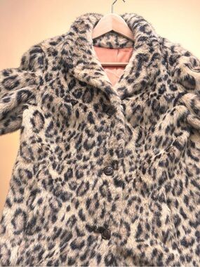Woman’s vintage 1960s/70’s Vintage Faux Fur Coat.